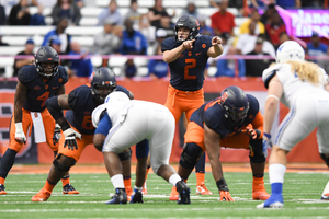 Syracuse steamrolled Central Connecticut State as Eric Dungey finished 28-for-36 with 328 yards and three touchdowns.