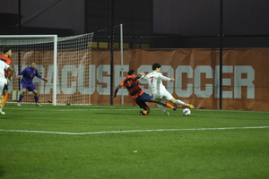 Virginia forward Leo Afonso scored his fourth goal in four games against Syracuse, but the Orange stormed back to defeat Virginia in penalties to advance to the ACC semifinals.